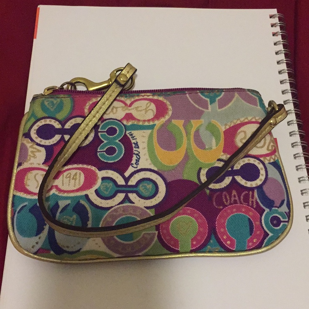 Coach mini purse with repositionable strap